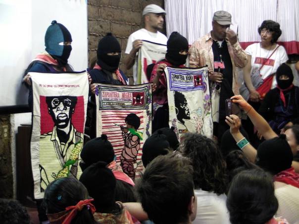 Caleb Duarte and Emory Douglas present the Zapatera Negra textile project at CompARTE in Chiapas.
